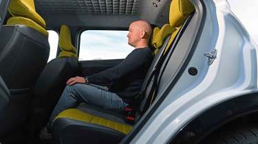 Renault 5 - rear seats with Chief reviewer, Alex Ingram